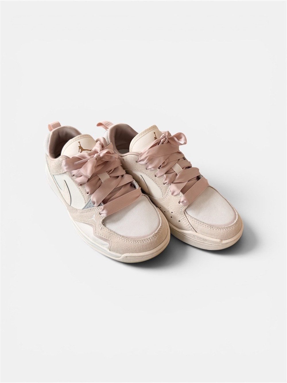 Nike Jordan Women’s Low-Top Sneakers in Blush Pink and Cream